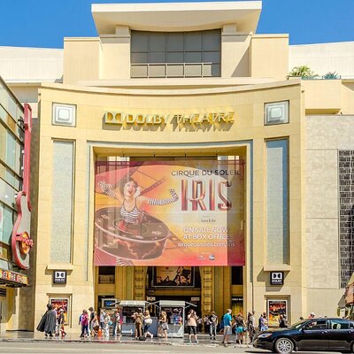 People and cars passing by the Dolby Theatre in Los Angeles